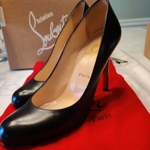 Christian Louboutin black pumps